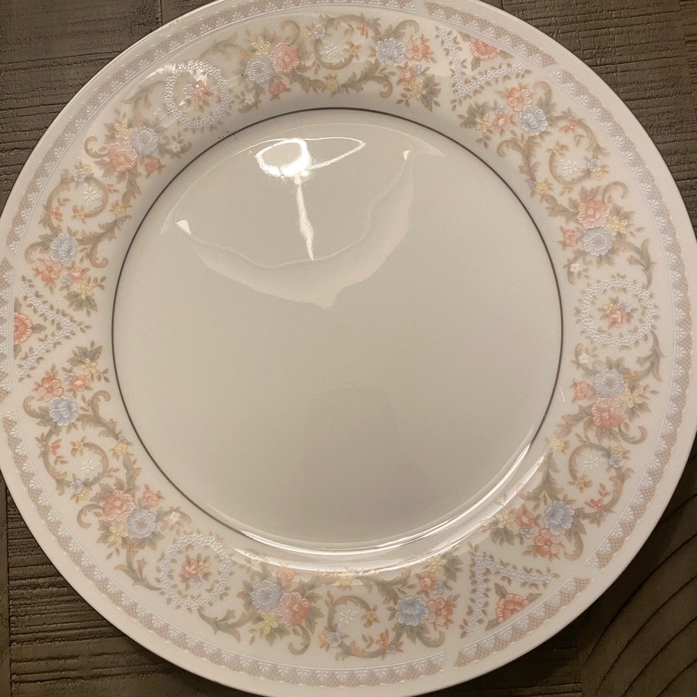 Vintage Silverie China. Service for eight. In original box new without tags.